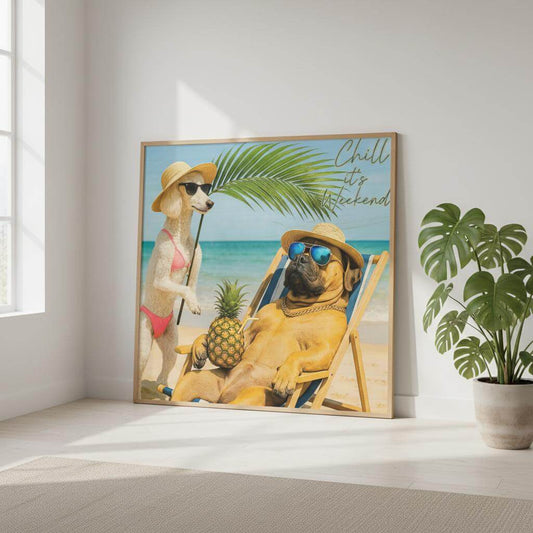 Framed artwork of two dogs on a beach with a pineapple, palm tree, and 'Chill It's Weekend' text.