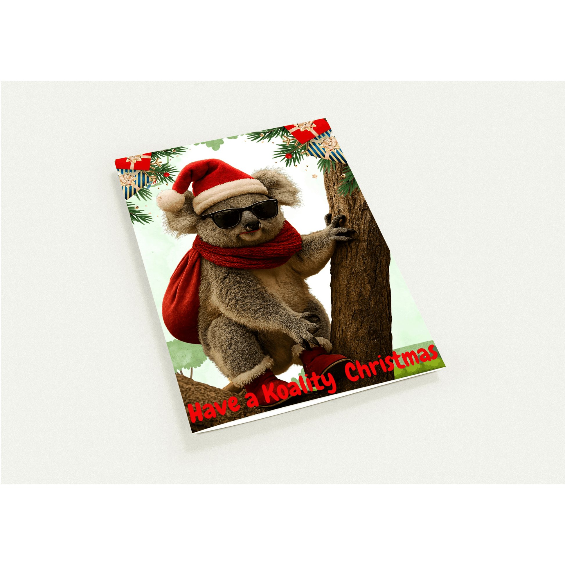 koala wearing a Santa hat and sunglasses, holding a Christmas bag, with text 'Have a Koality Christmas' 