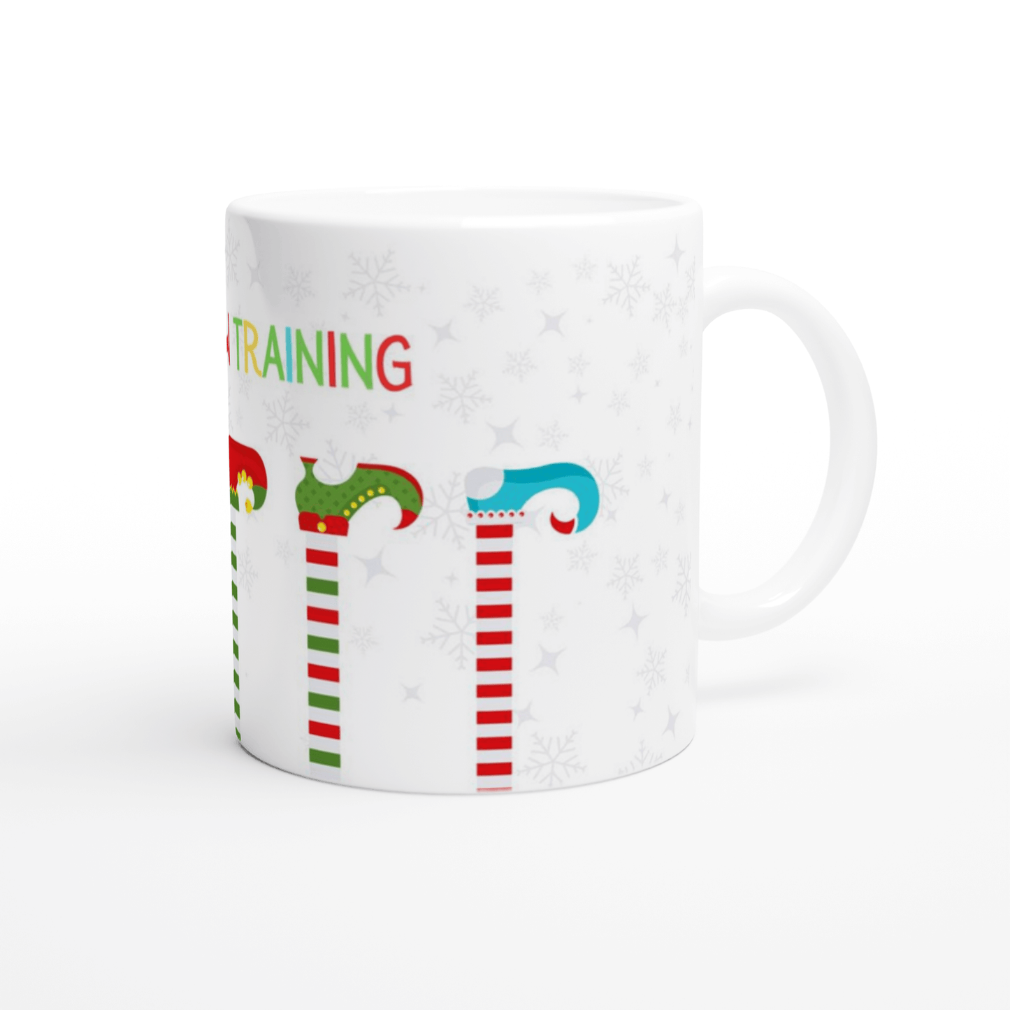 White mug with Christmas-themed design and text