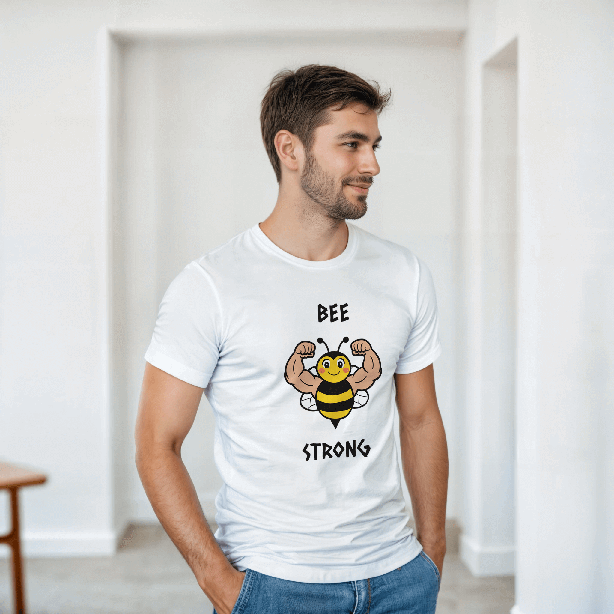  a white t-shirt with a bee graphic and 'BEE STRONG' text