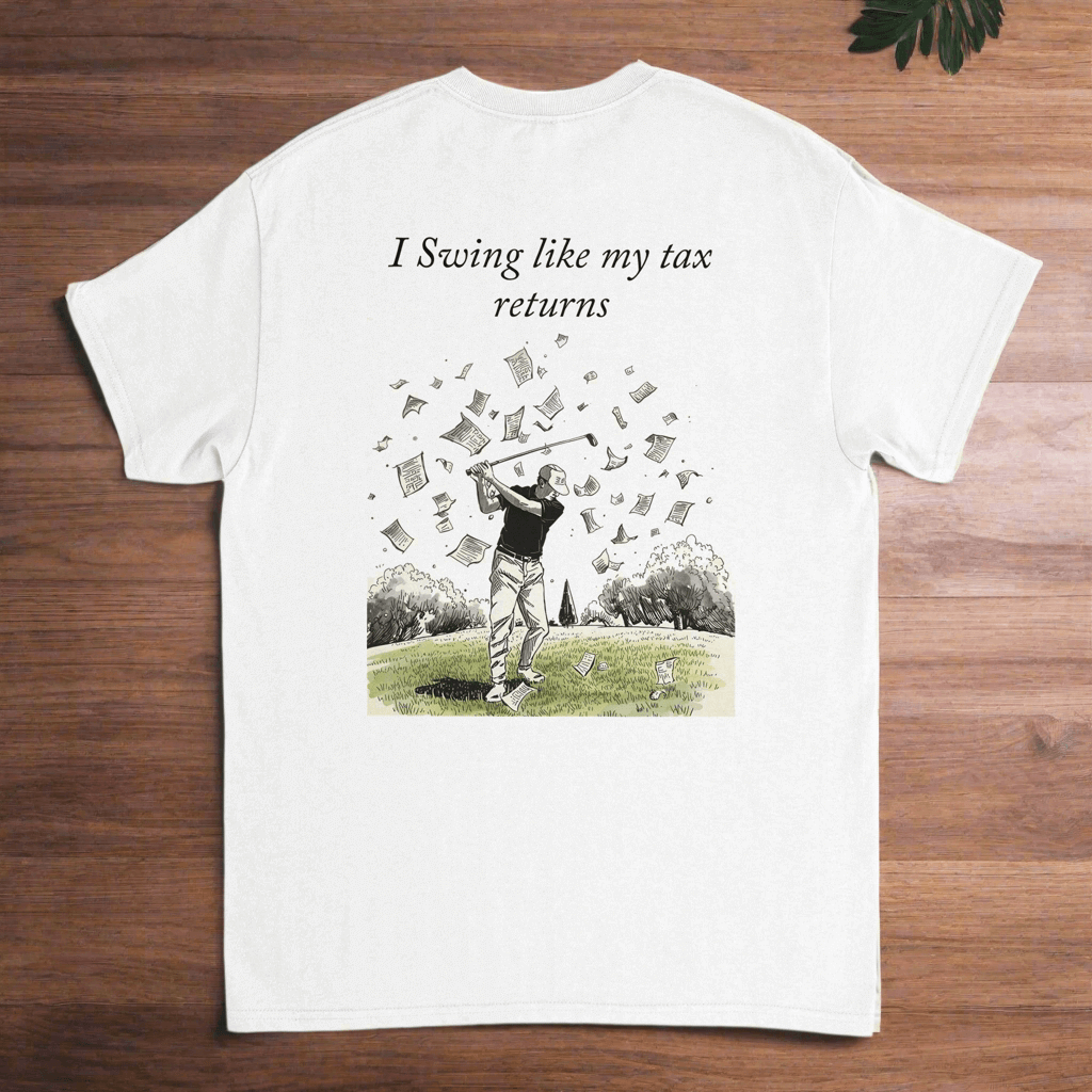 White t-shirt with a graphic of a golfer and text 'I Swing like my tax returns'