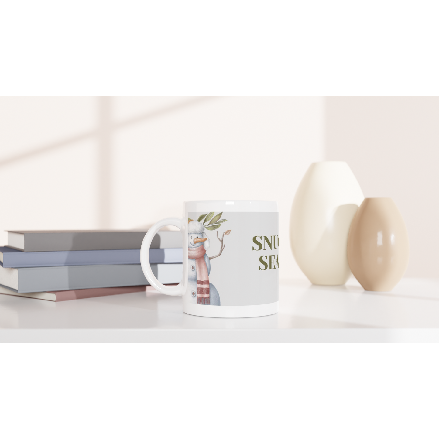 White mug with snowman design and 'Snow Season' text 