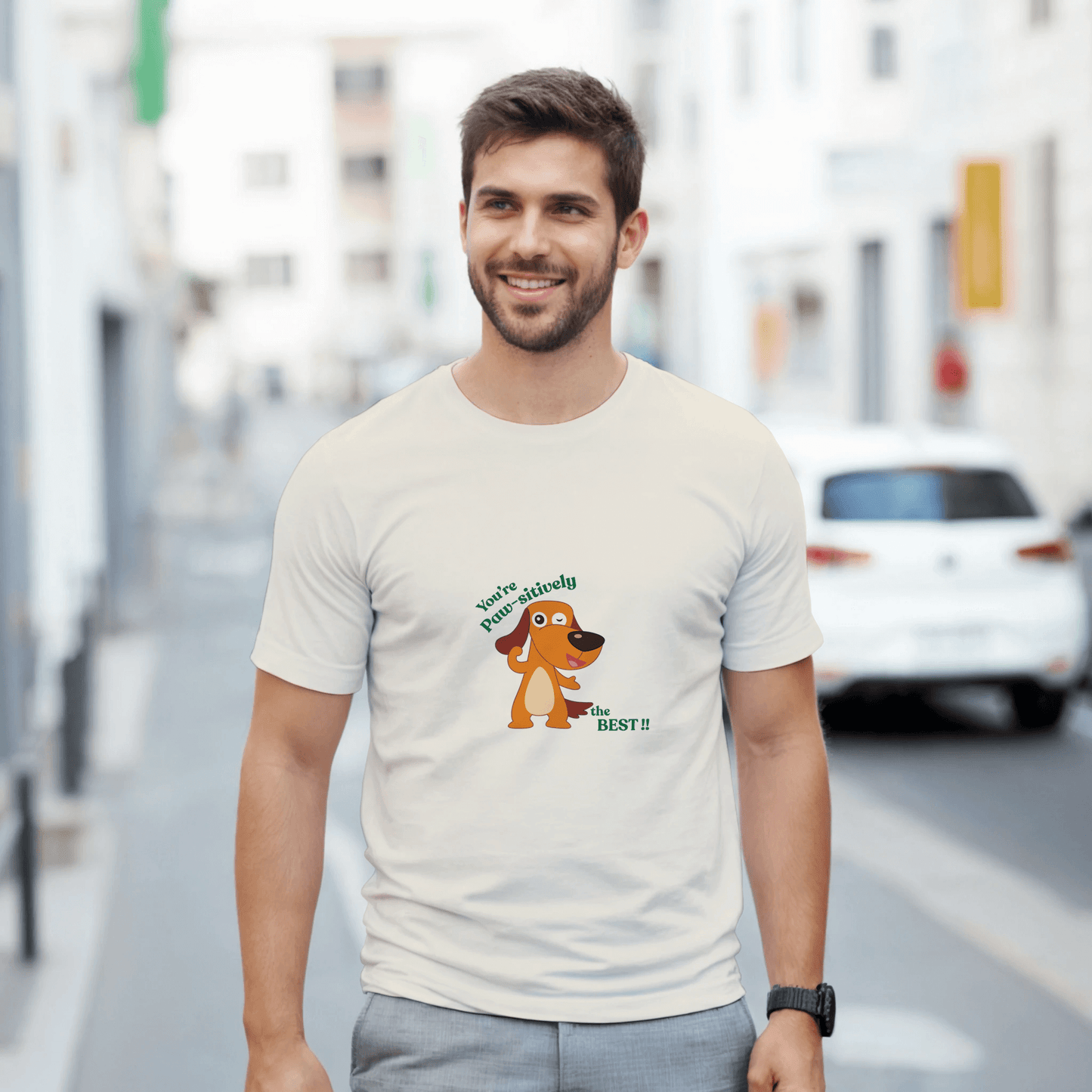 a white t-shirt with a cartoon dog graphic 