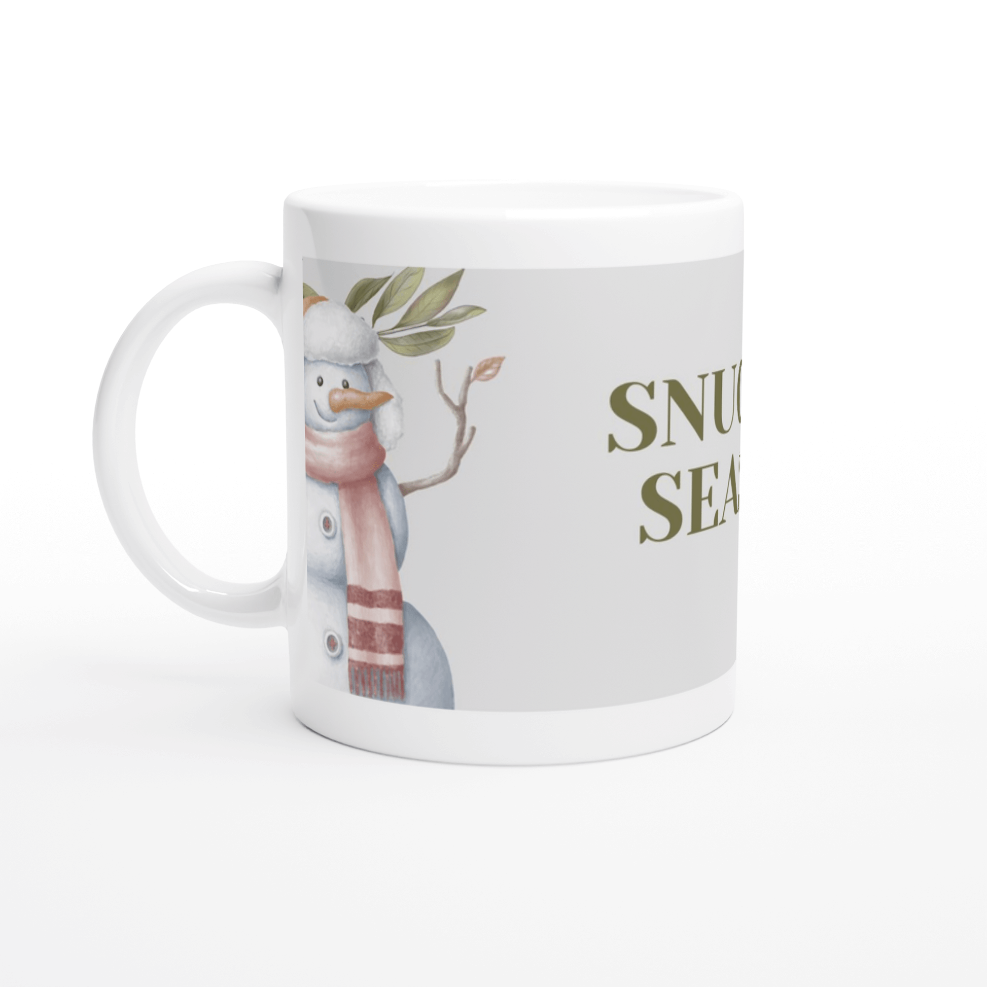 White mug with a snowman design and 'Snuggle Season' text 