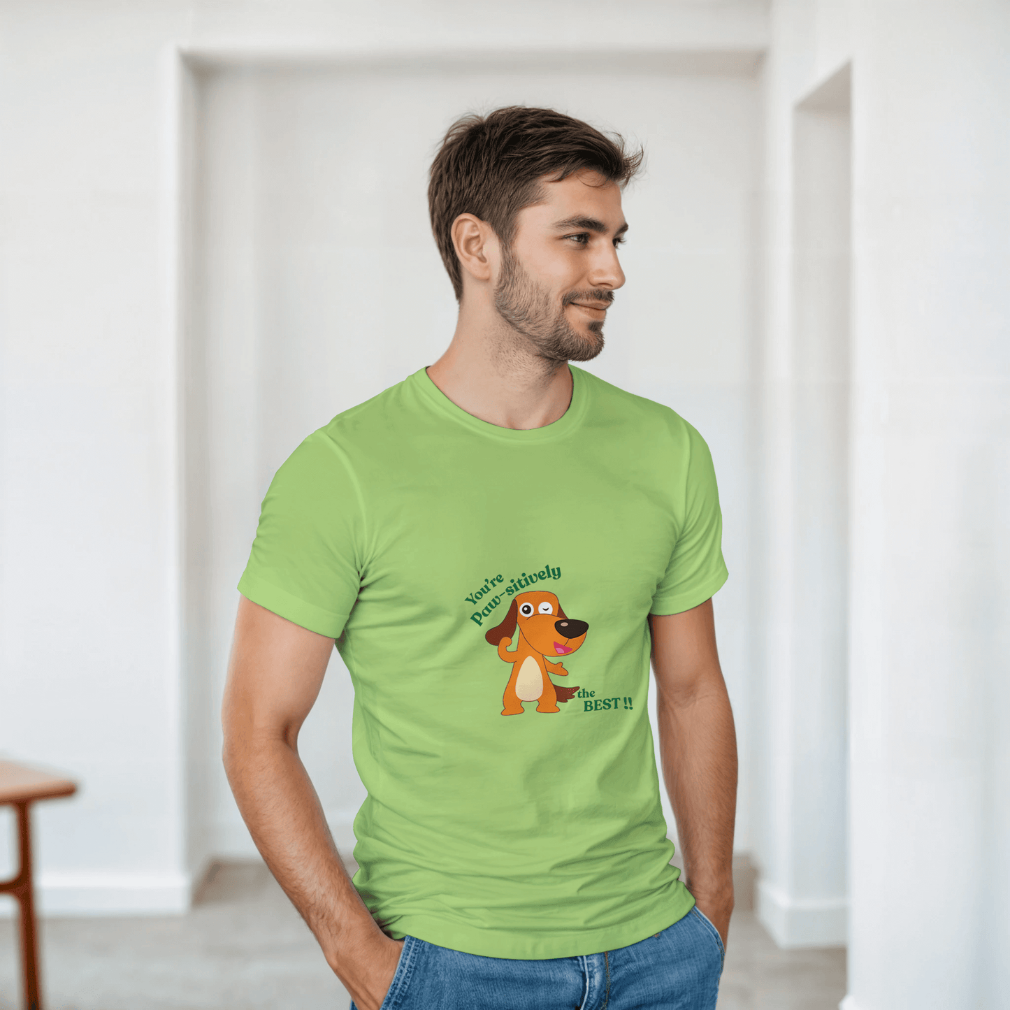  a green t-shirt with a dog graphic and text 