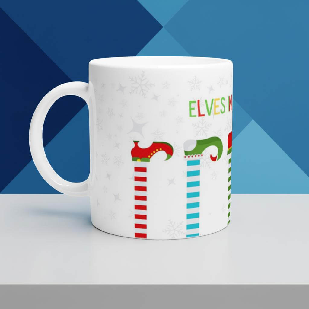 White mug with Christmas-themed design 