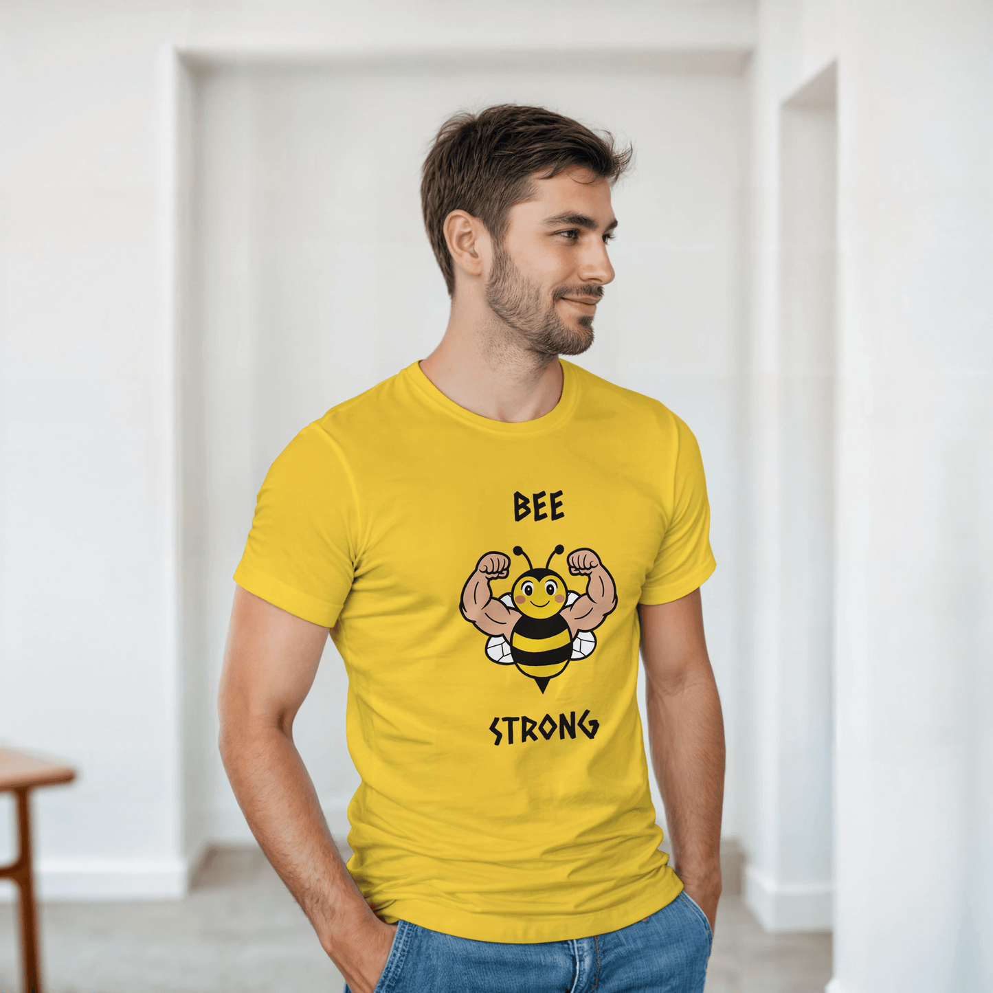  a yellow t-shirt with a bee graphic and 'BEE STRONG' text.