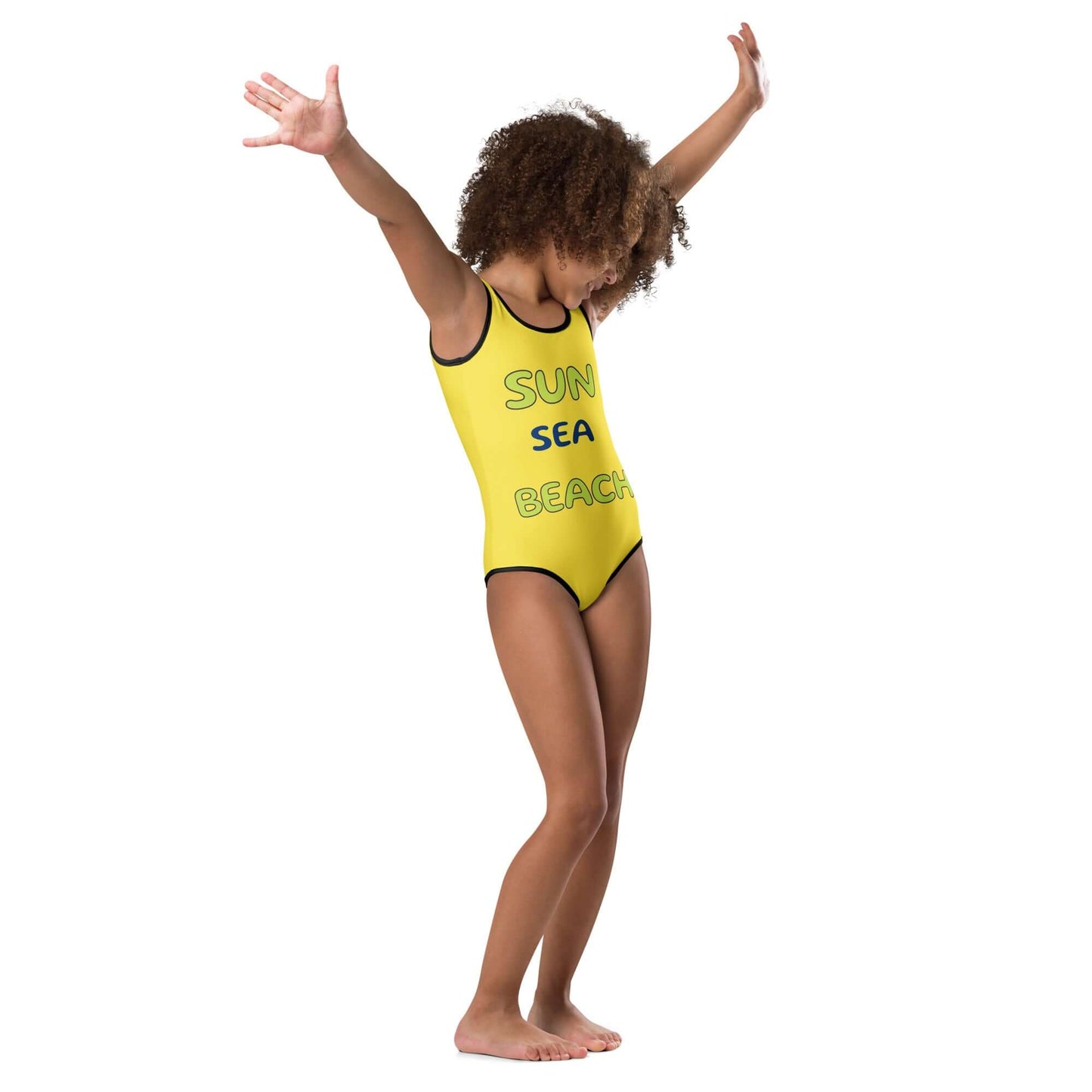 Child wearing a yellow swimsuit with 'Sun Sea Beach' text