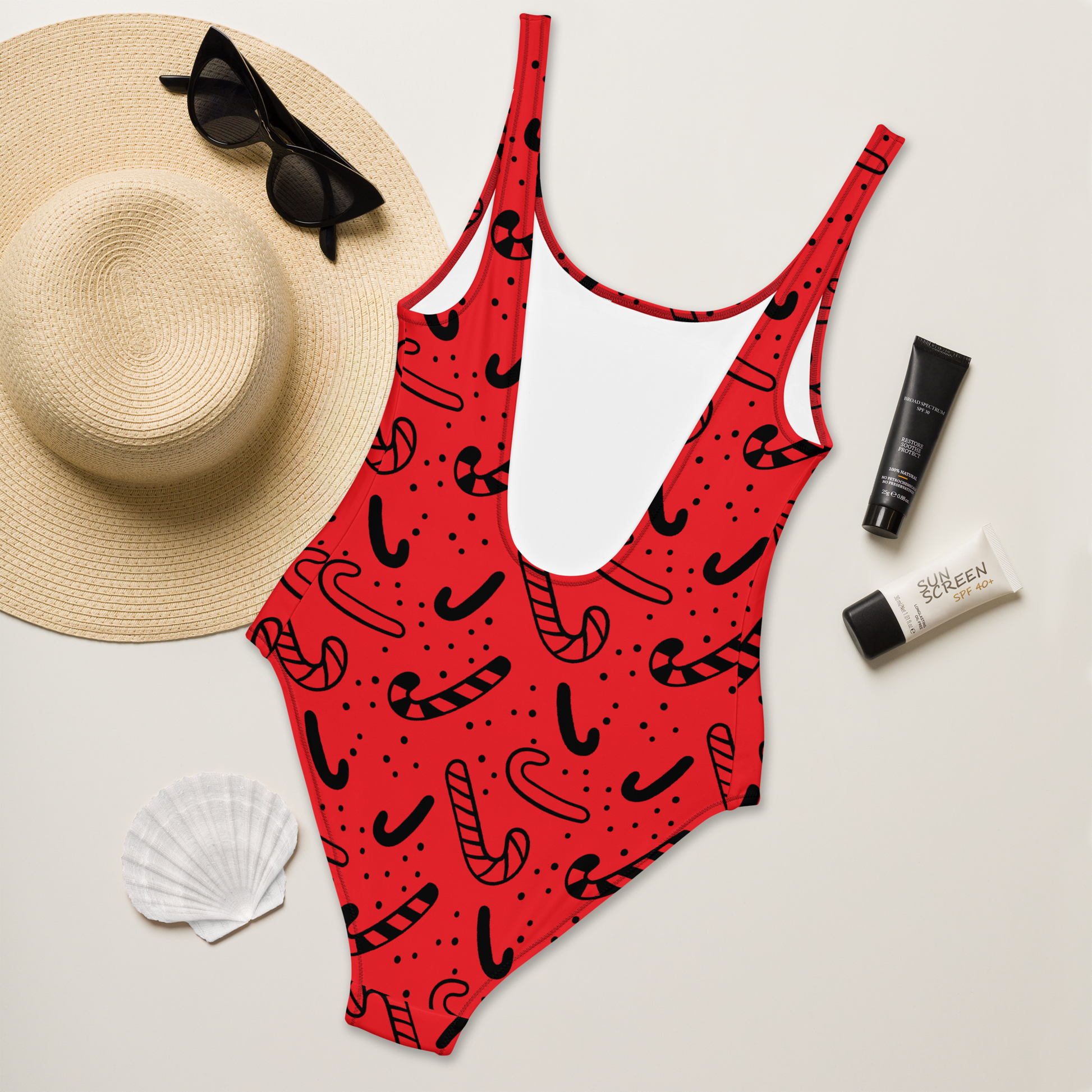 Red swimsuit with black candy cane pattern